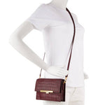 EXOTIC CROCO LEE CLUTCH